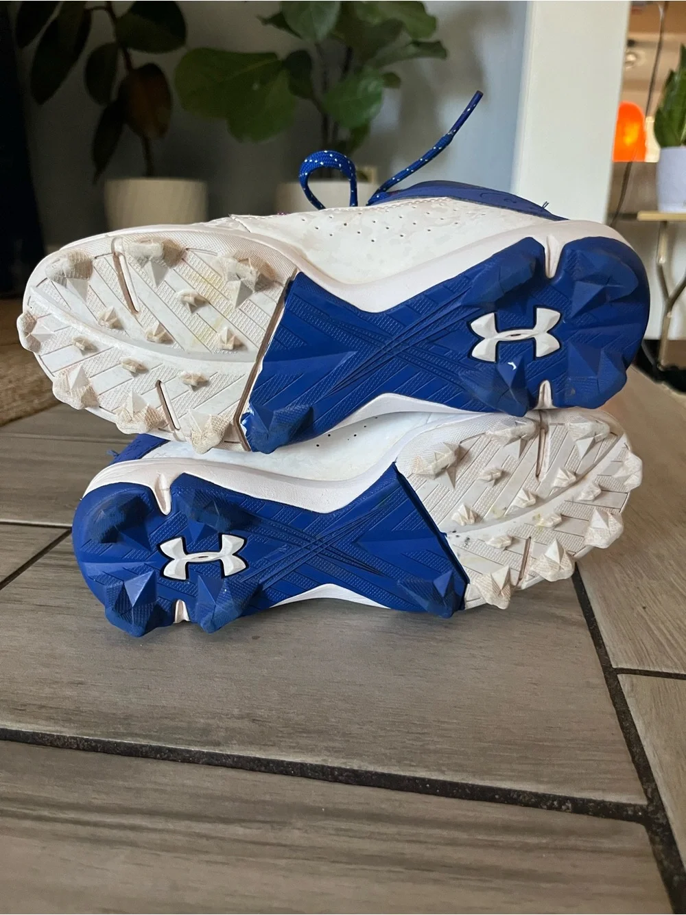 Under Armour Kids White and Blue Cleats with Neon Accents